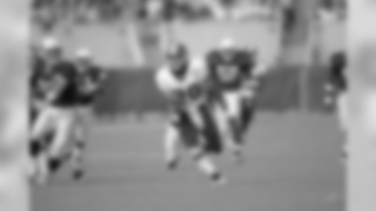 Washington Brian Mitchell runs with a 63-yard punt return for a touchdown during an NFL Football game against the Arizona Cardinals on Sunday, Dec. 7, 1997 in Tempe, Arizona. Washington won 38-28.
