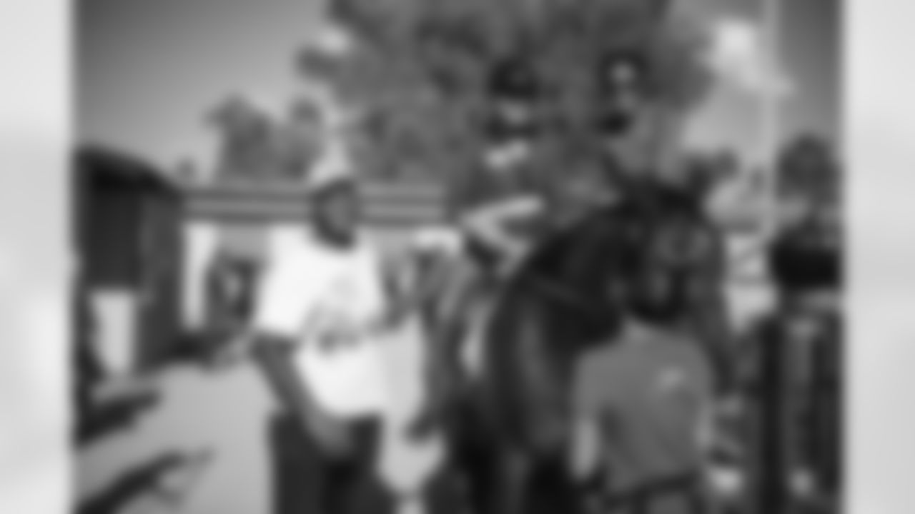 The Arizona Cardinals visit Hunkapi Farms to work with therapy horses and families with ALS on Saturday, May 13, 2023 in Scottsdale, AZ.