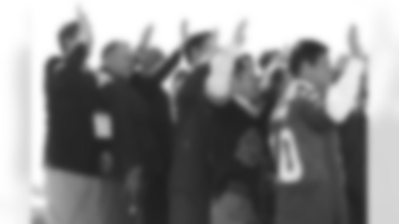 Bill Bidwill waves during the NYSE webcast