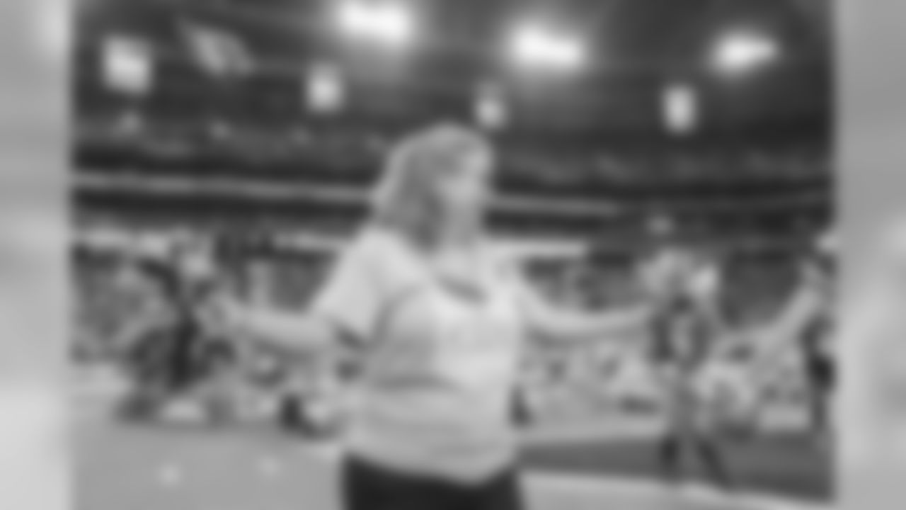 Images from halftime of the Falcons game, where Cardinals cheerleaders performed with cancer survivors and their caregivers to raise awareness for early detection and prevention