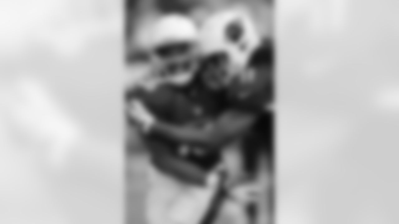 RB Beanie Wells, WR Larry Fitzgerald