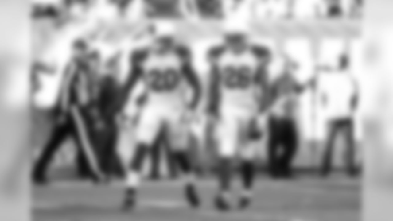 S Deone Bucannon (left) congratulates S Rashad Johnson after an interception in Cleveland