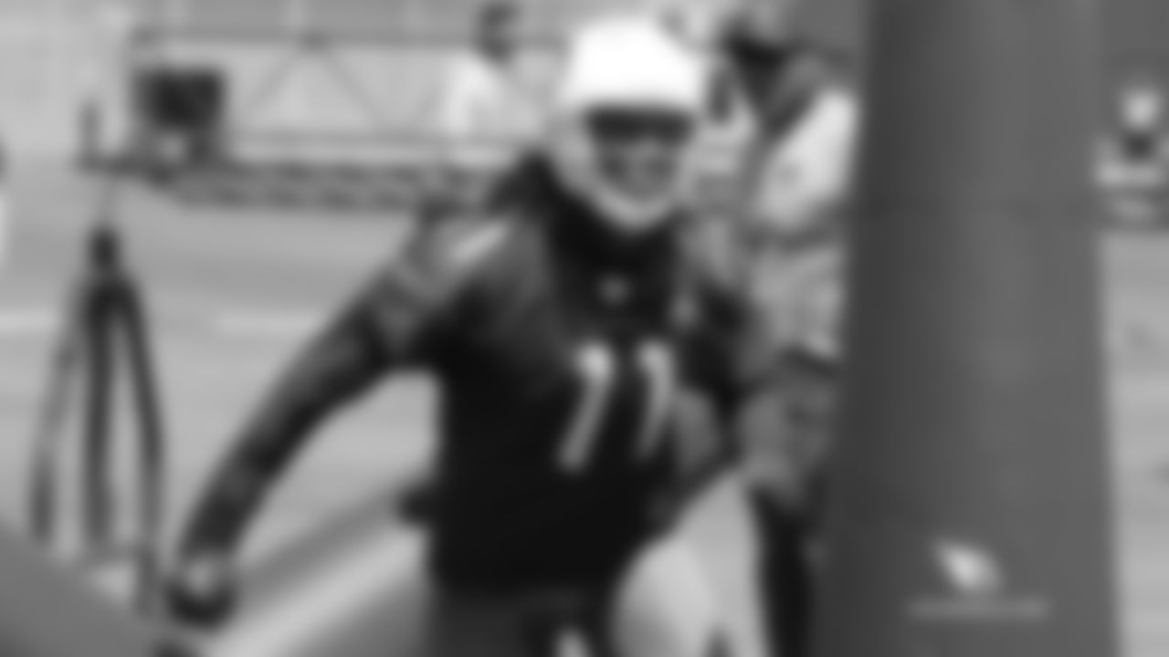 WR Larry Fitzgerald goes through defensive line drills