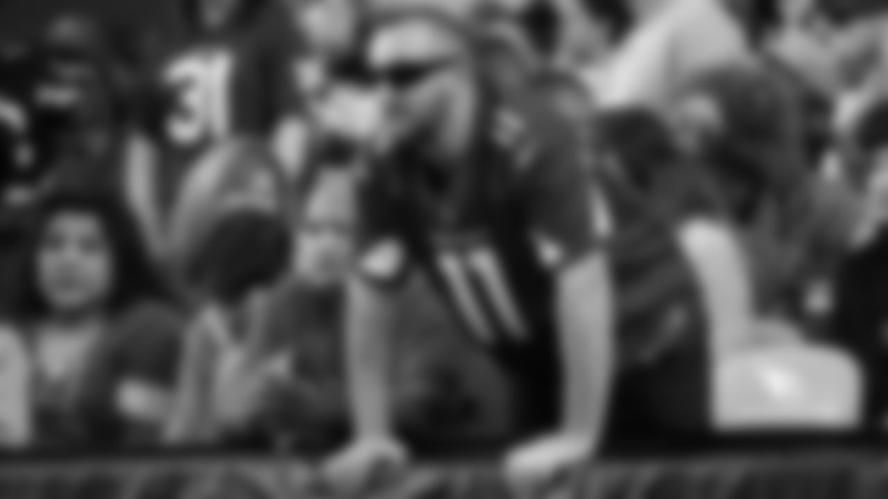 Images of Cardinals fans at State Farm Stadium during the Week 14 matchup against Detroit