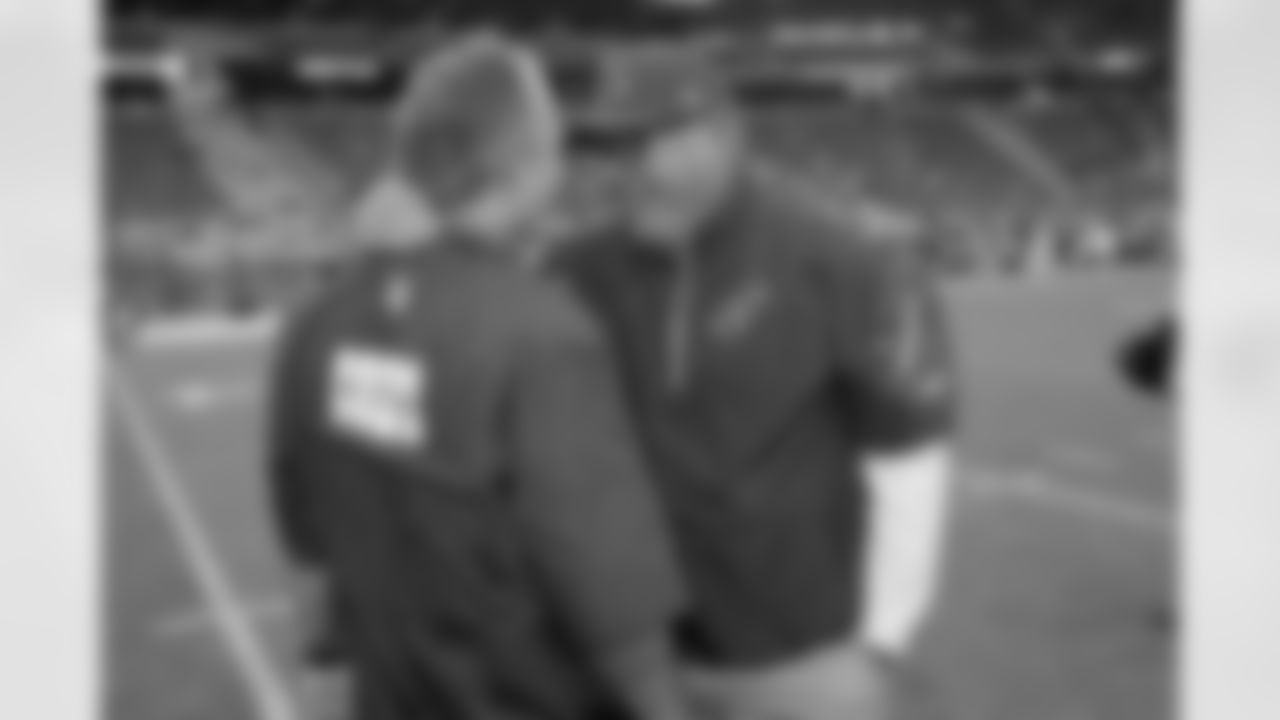 Bruce Arians hugs Chuck Pagano before the Colts game.