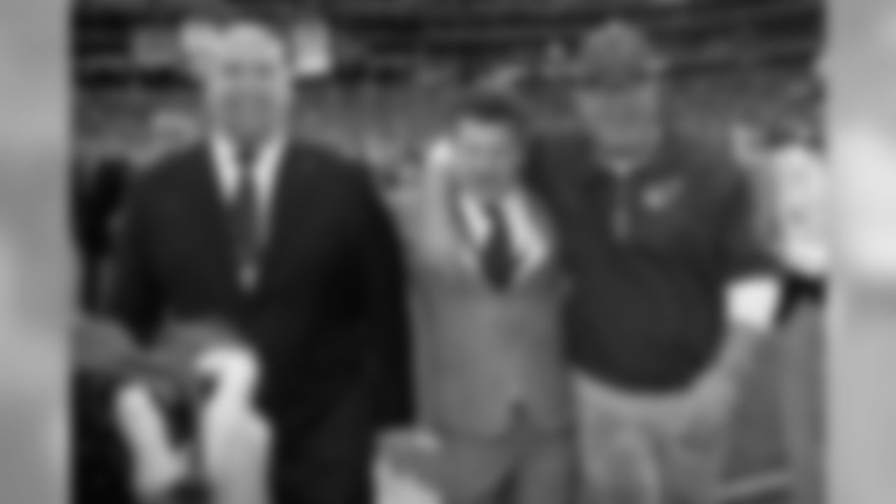 Keim, Michael Bidwill and Bruce Arians after the first win of the Keim/Arians regime