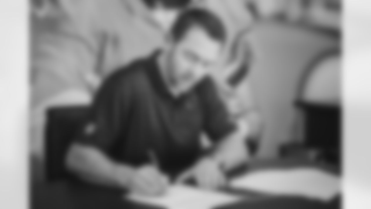 QB Colt McCoy continues the process of signing his new contract