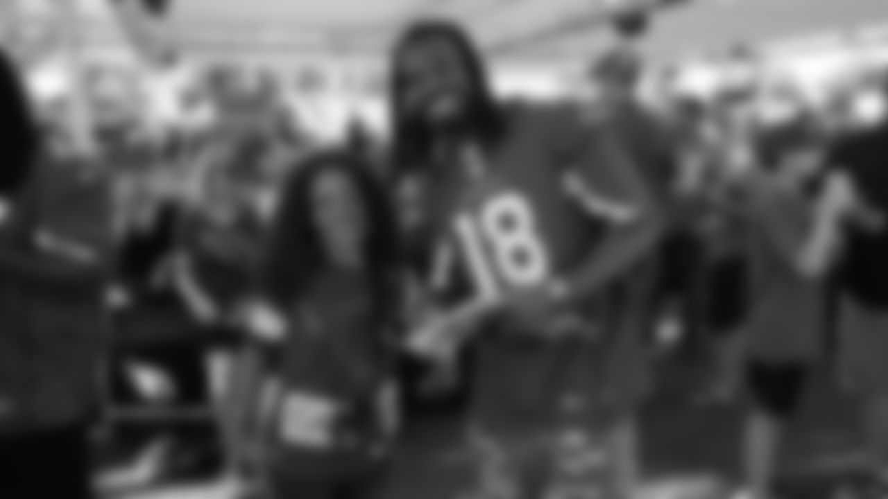 WR Kevin White takes a photo with a fan from the Cardinals' draft party outside State Farm Stadium last Thursday