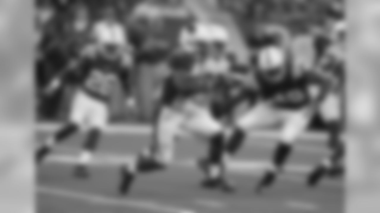 RB Kerwynn Williams tries to find a hole to run