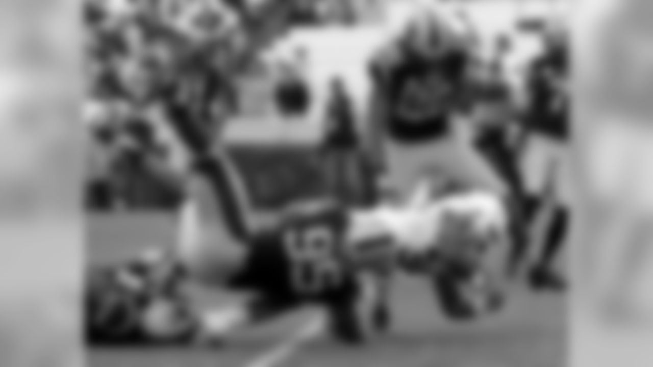 DE Kareem Martin tackles Old Dominion's Colby Goodwyn on Nov. 23, 2013
