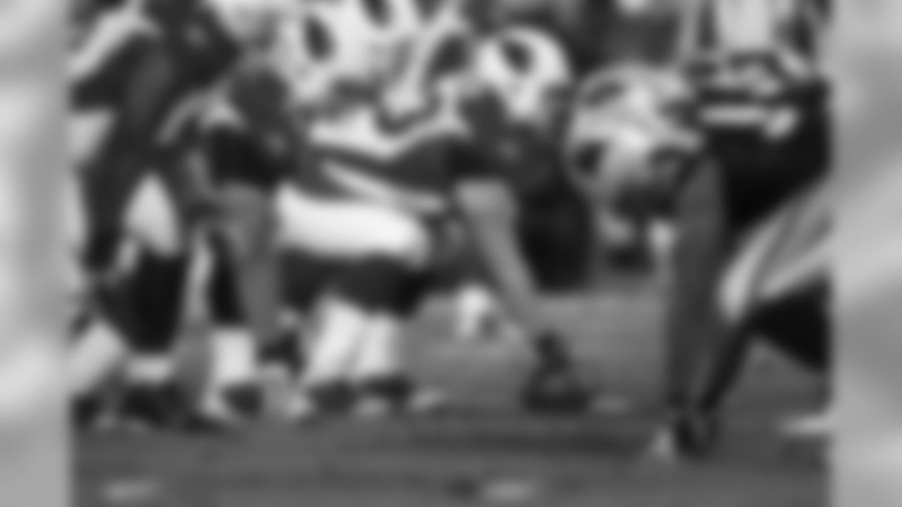 C Lyle Sendlein prepares to snap the ball.
