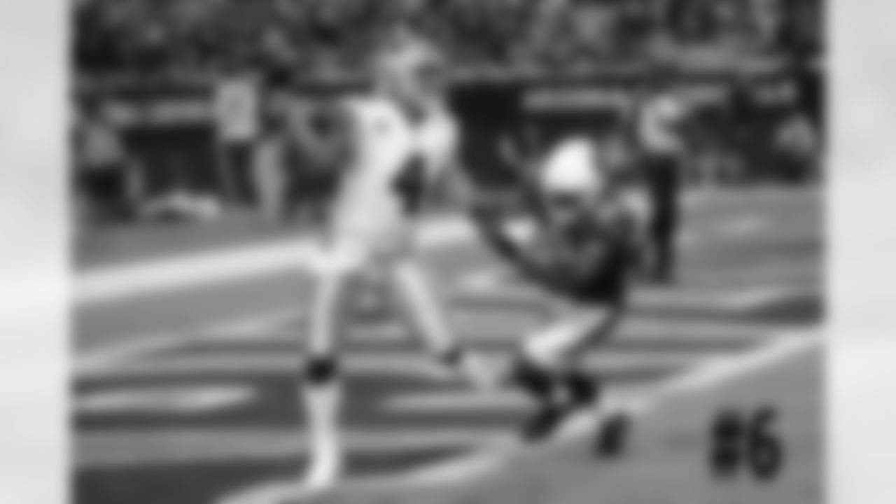 S Budda Baker chases Cowboys QB Dak Prescott