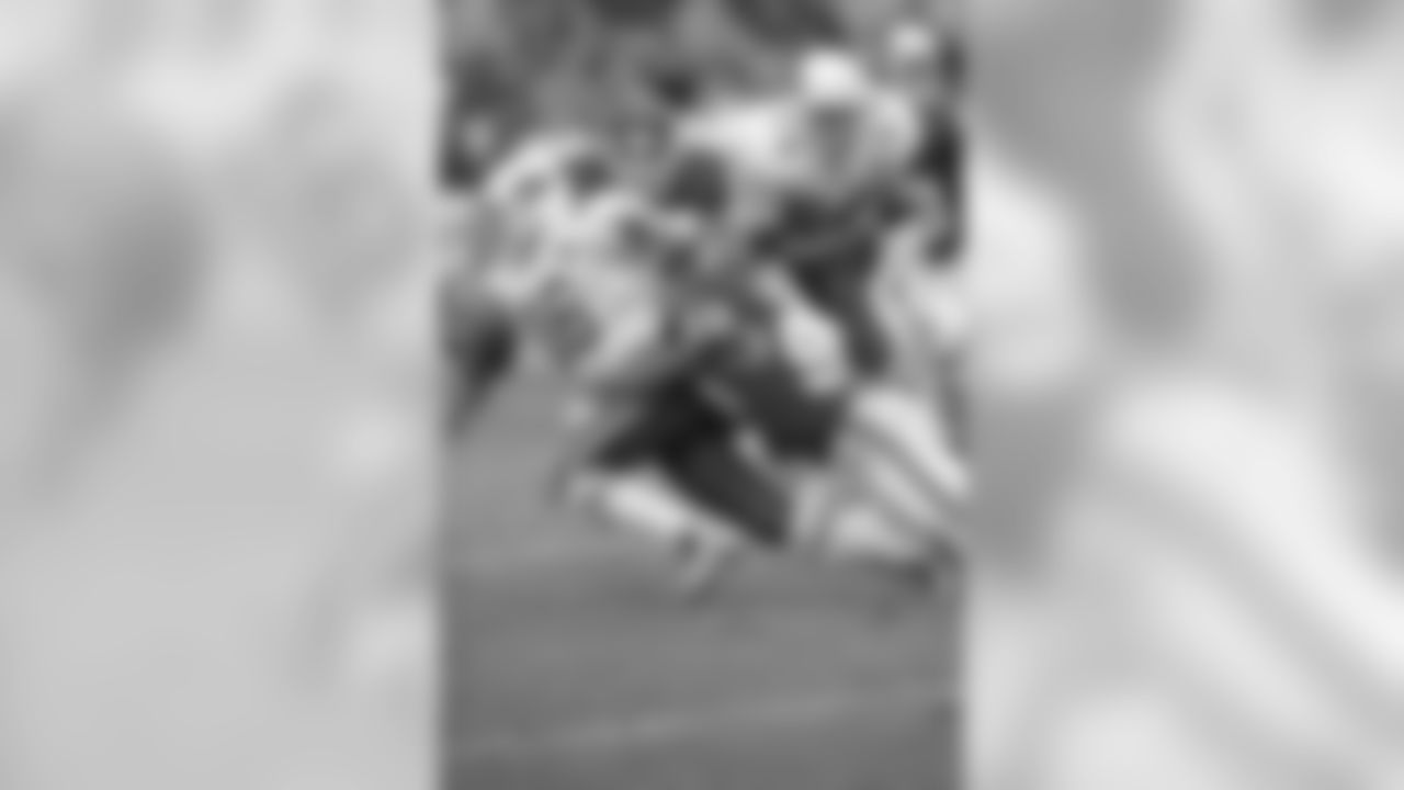 1998: QB Jake Plummer is brought down by Kansas City LB Anthony Davis