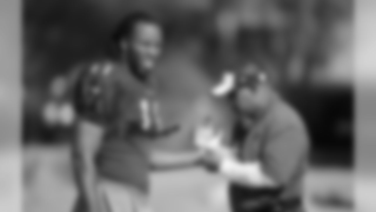 WR Larry Fitzgerald is taped up before practice