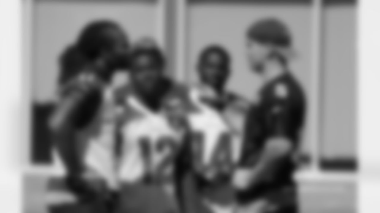 QB Drew Stanton (5) talks with receivers Larry Fitzgerald (11), John Brown (12) and J.J. Nelson