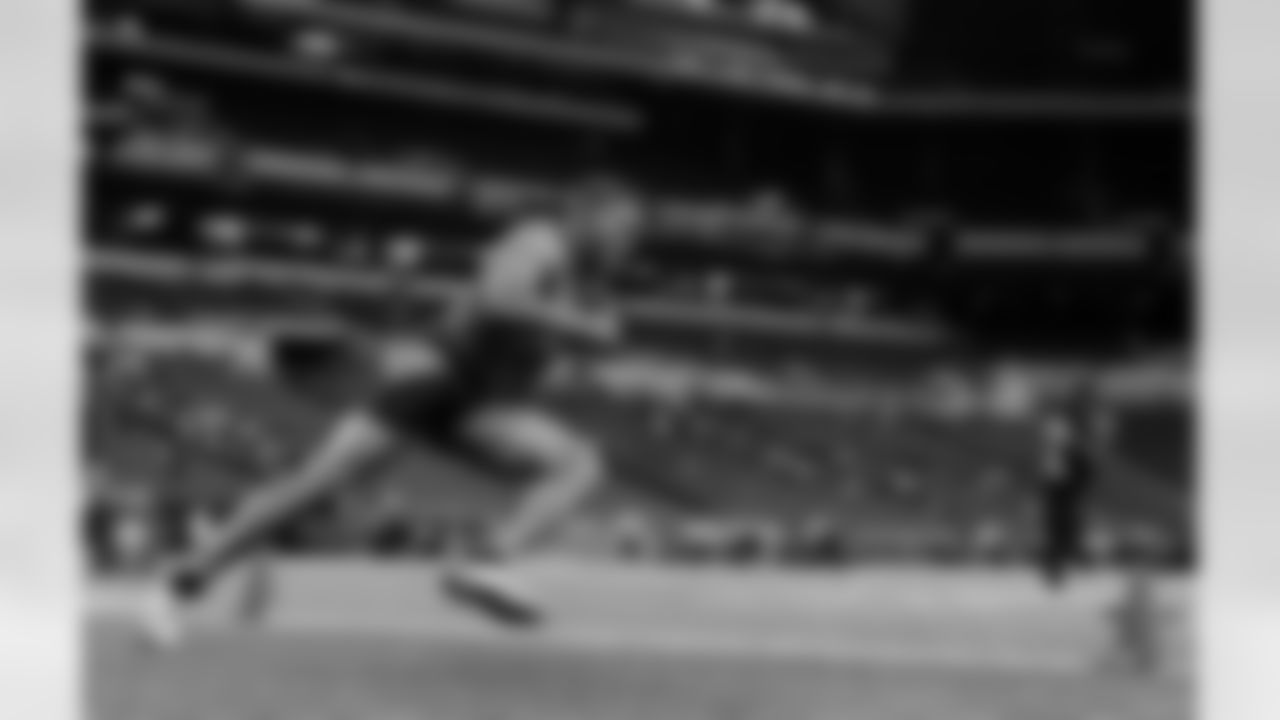 Auburn QB Cam Newton races in a drill