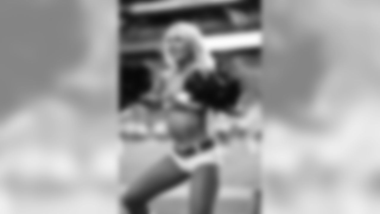 Images of Cardinals cheerleader Davis during the 2019 season