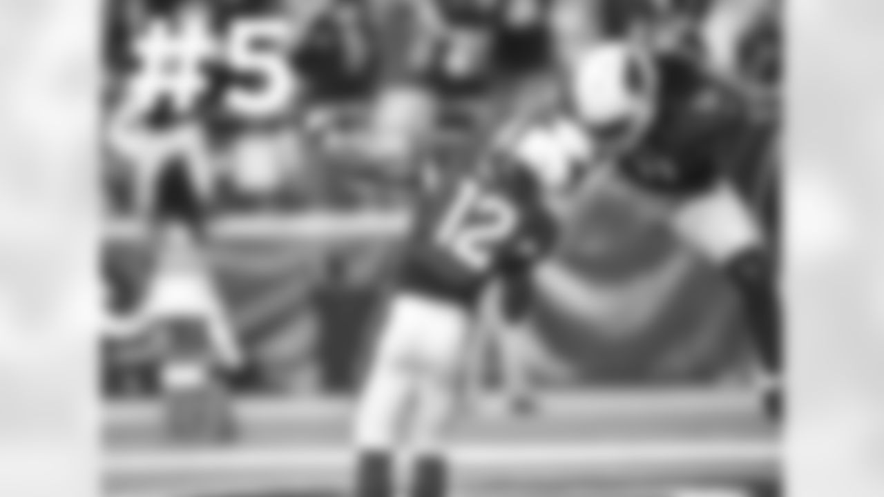 WR Larry Fitzgerald celebrates the game-winning TD reception by WR John Brown