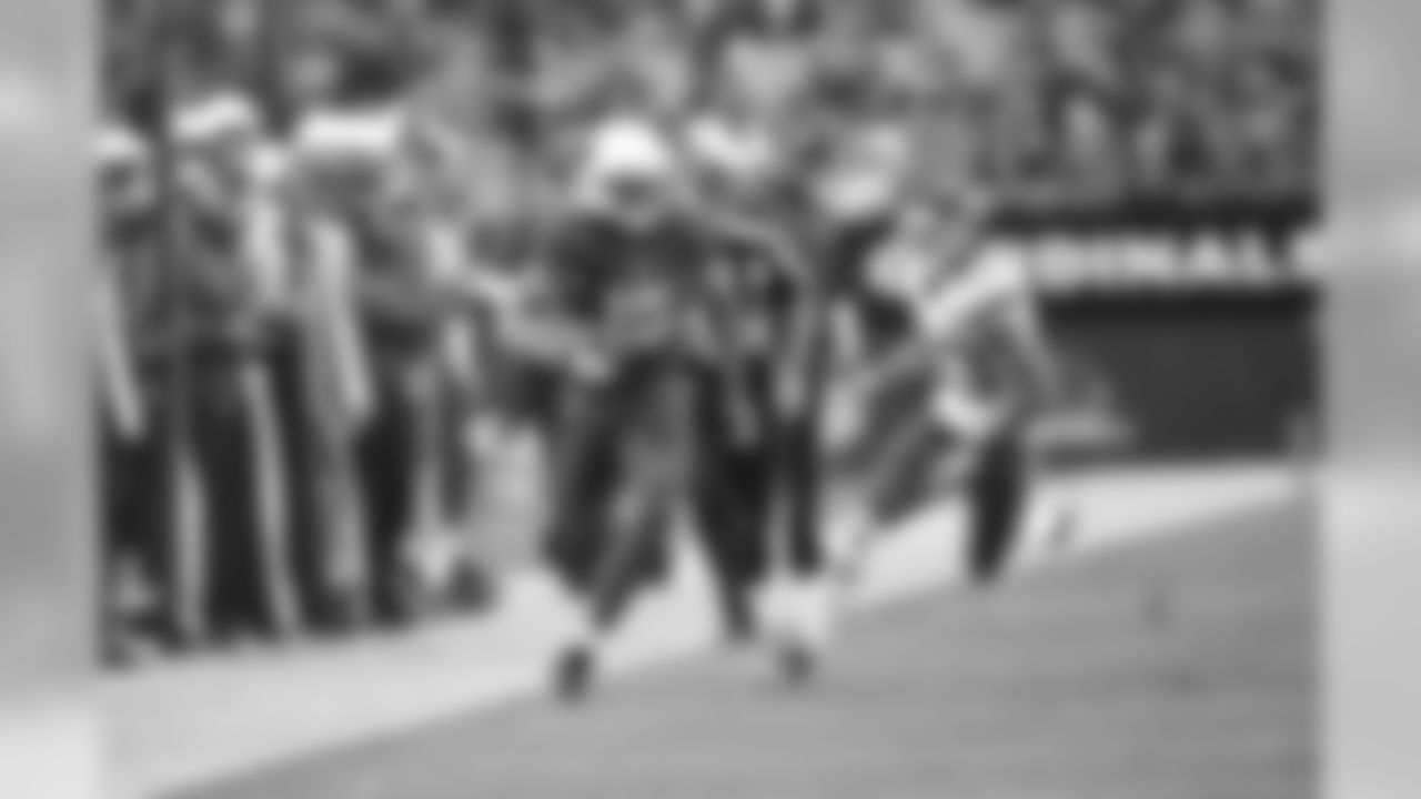 Floyd up the sideline on his way to a 45-yard gain