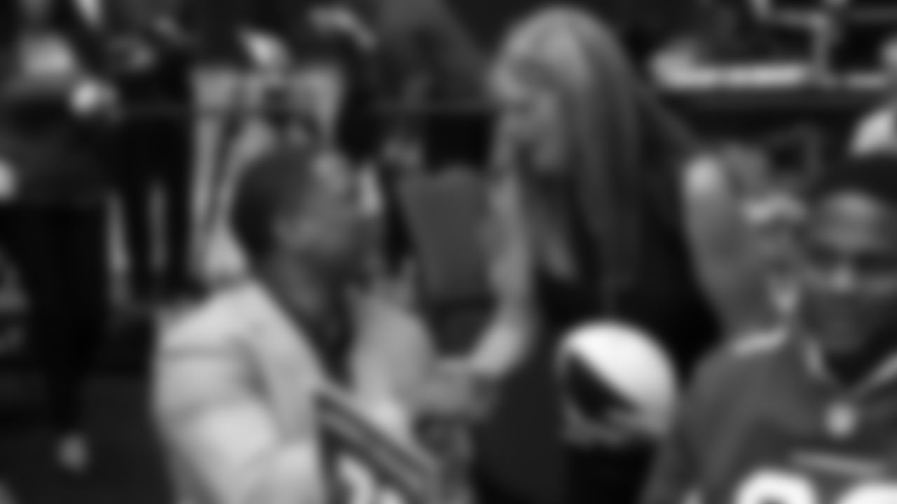 Coach Steve Wilks shakes the hand of a fan