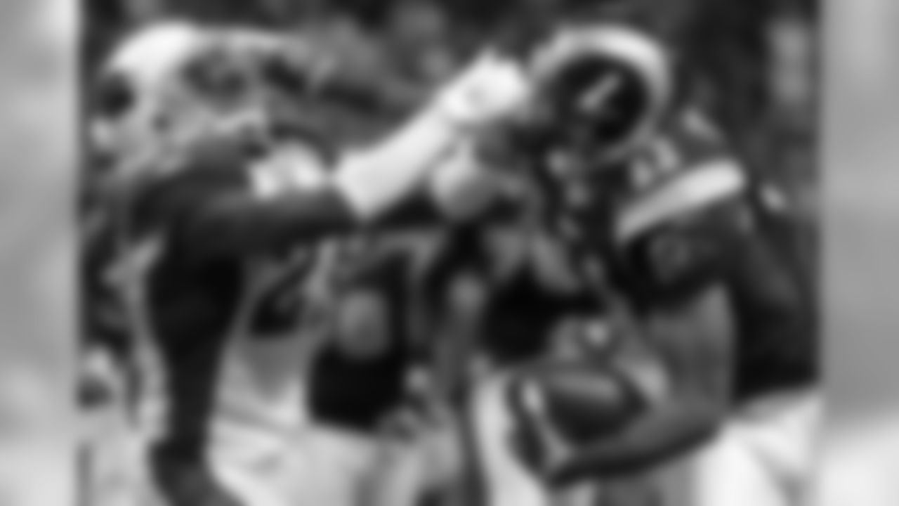 2009: Rams WR Brandon Gibson tries to get away from Cardinals CB Michael Adams
