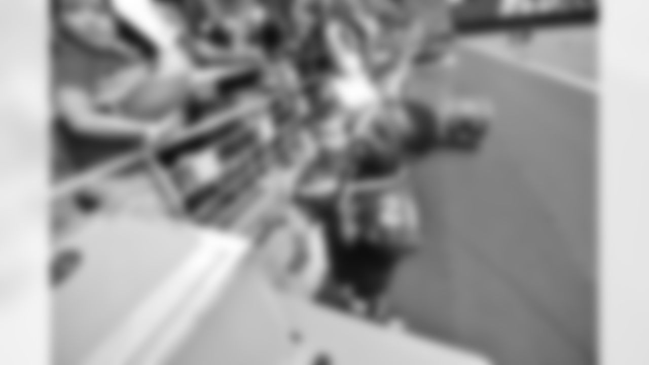 CB Patrick Peterson picked up a baby while signing