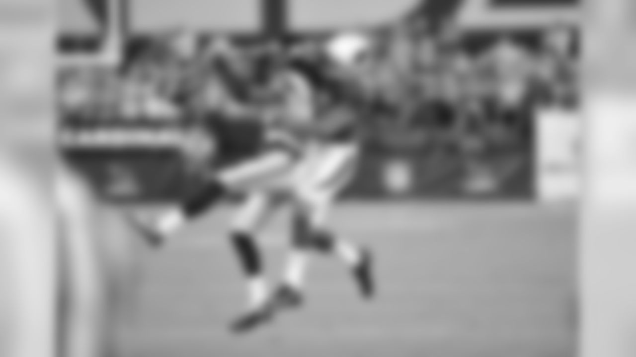 WR Michael Floyd bats down a ball from Seahawks CB Richard Sherman