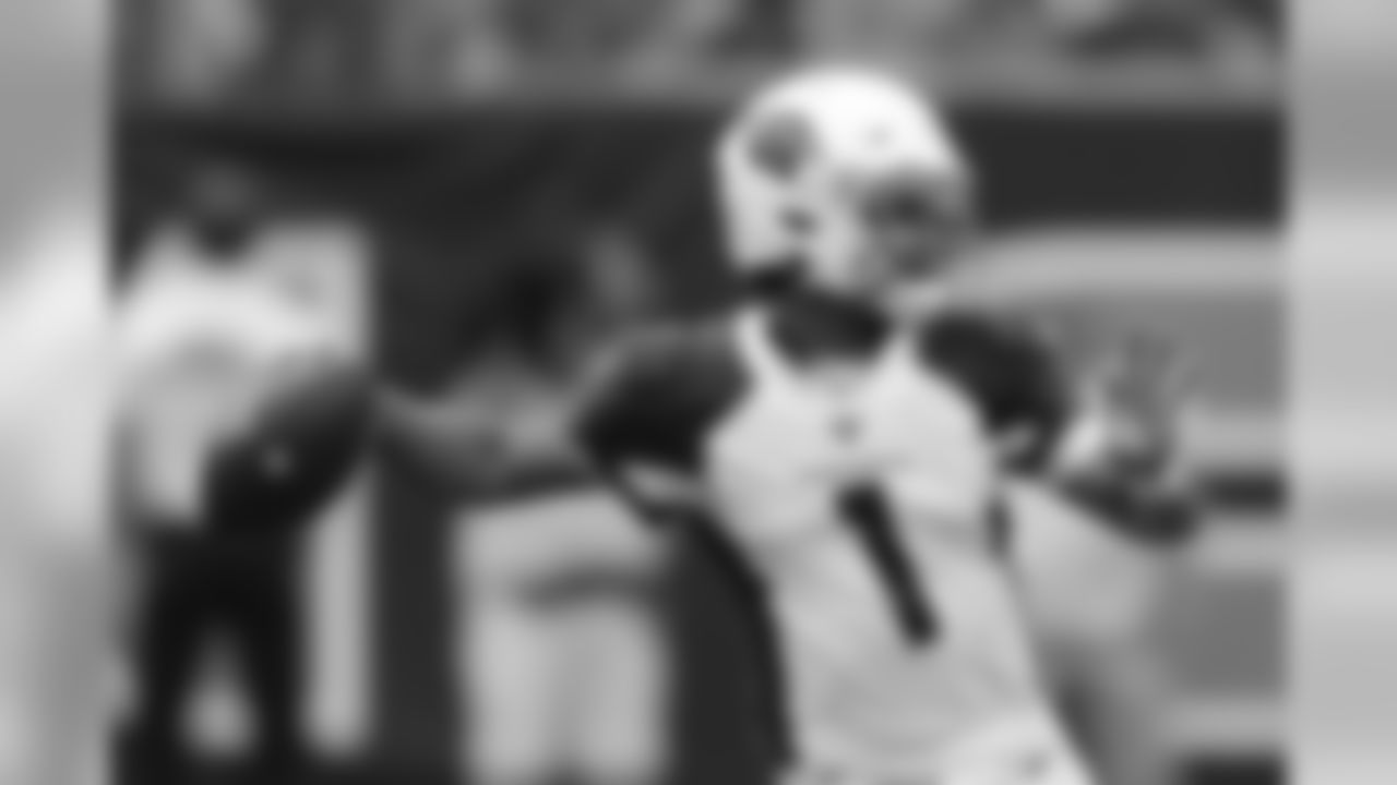 Cardinals quarterback Kyler Murray looks to throw.