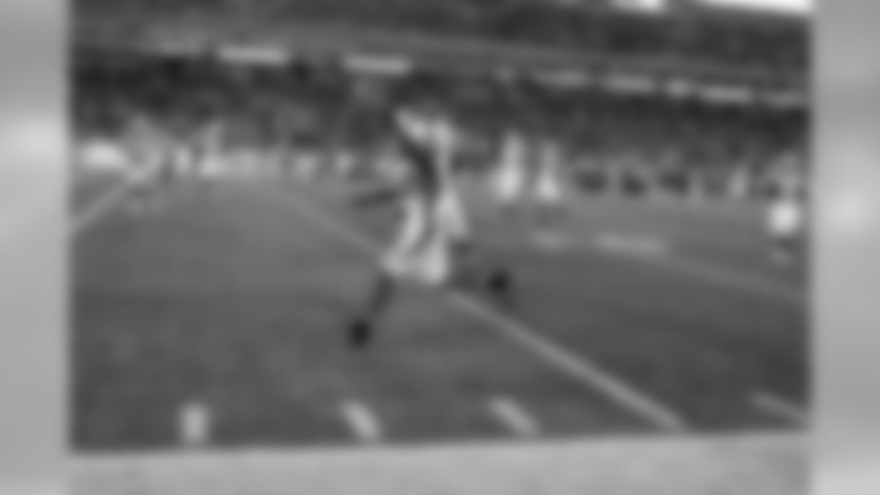 CB Antoine Cason returns an interception for a touchdown against the Titans.