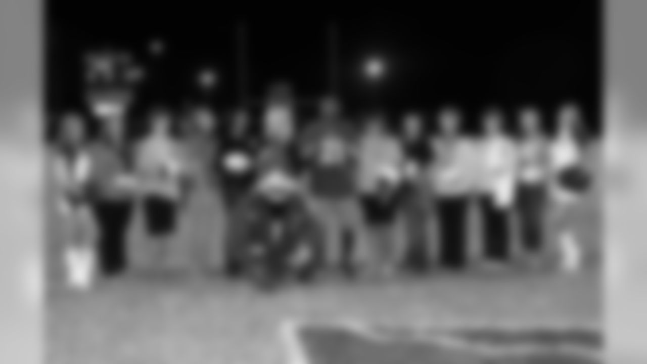 A shot of the breast cancer survivors and the Cardinals' group
