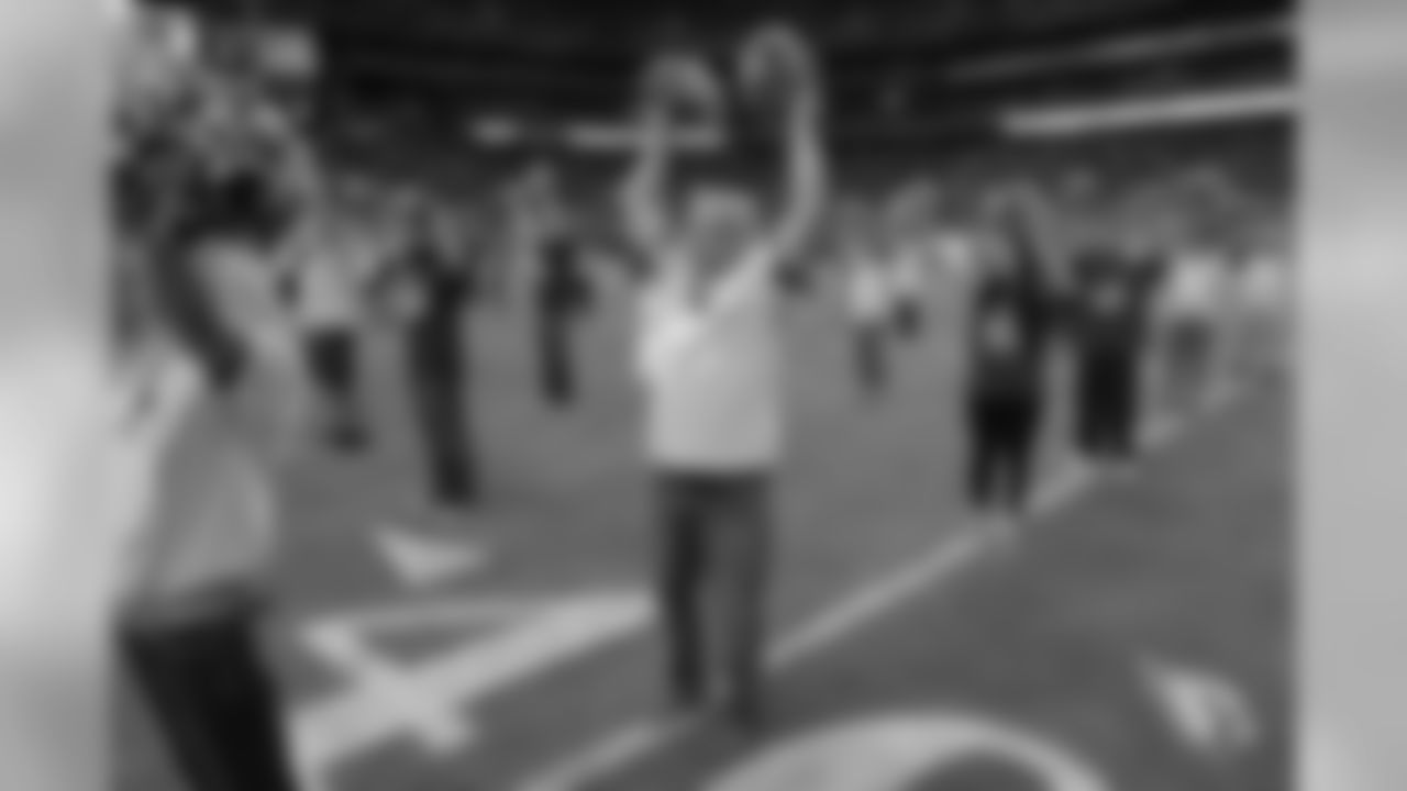 Images from halftime of the Falcons game, where Cardinals cheerleaders performed with cancer survivors and their caregivers to raise awareness for early detection and prevention