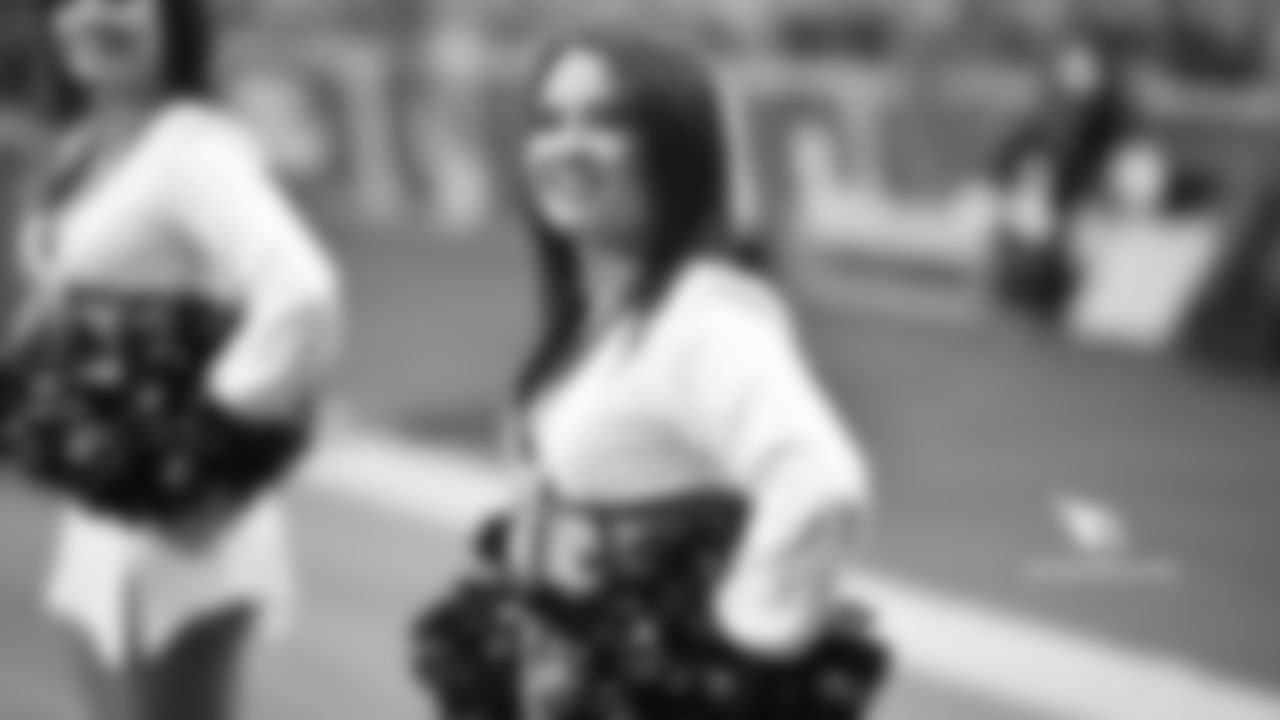 Images of Cardinals cheerleader Kayla during the 2018 season