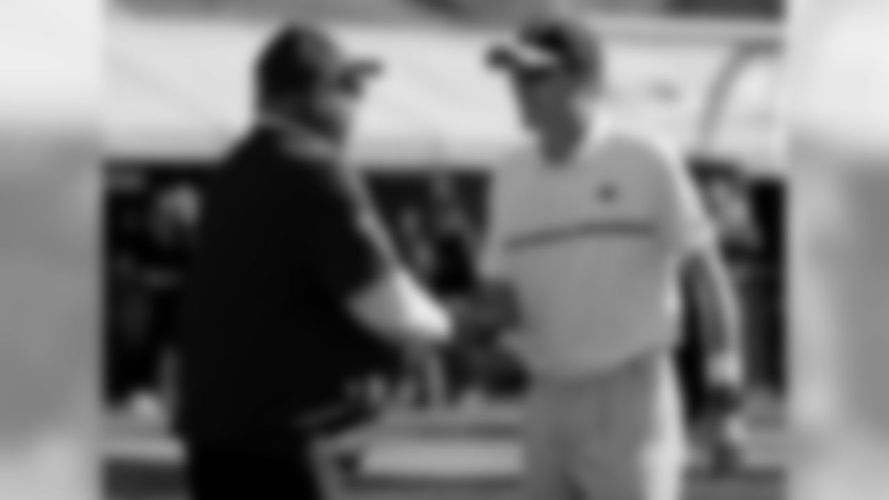 Coach Bruce Arians with Rams coach John Fassel
