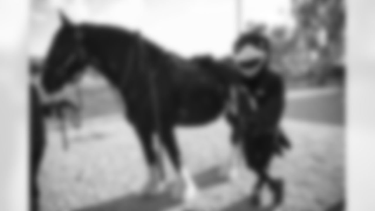 The Arizona Cardinals visit Hunkapi Farms to work with therapy horses and families with ALS on Saturday, May 13, 2023 in Scottsdale, AZ.