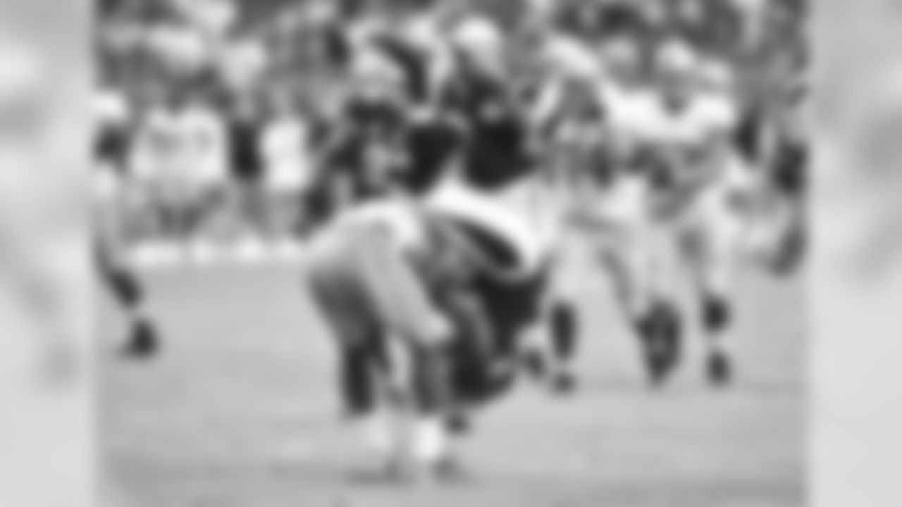 S Deone Bucannon is flipped over by 49ers WR Michael Crabtree