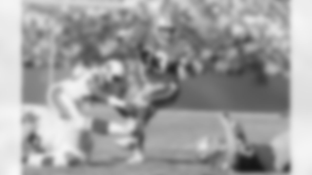 Ken Sims tackles Roger Craig in 1987