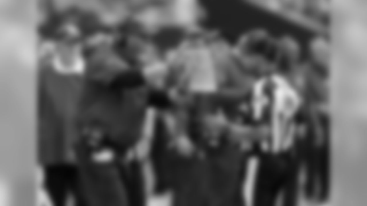 Head coach Bruce Arians pleads with the official