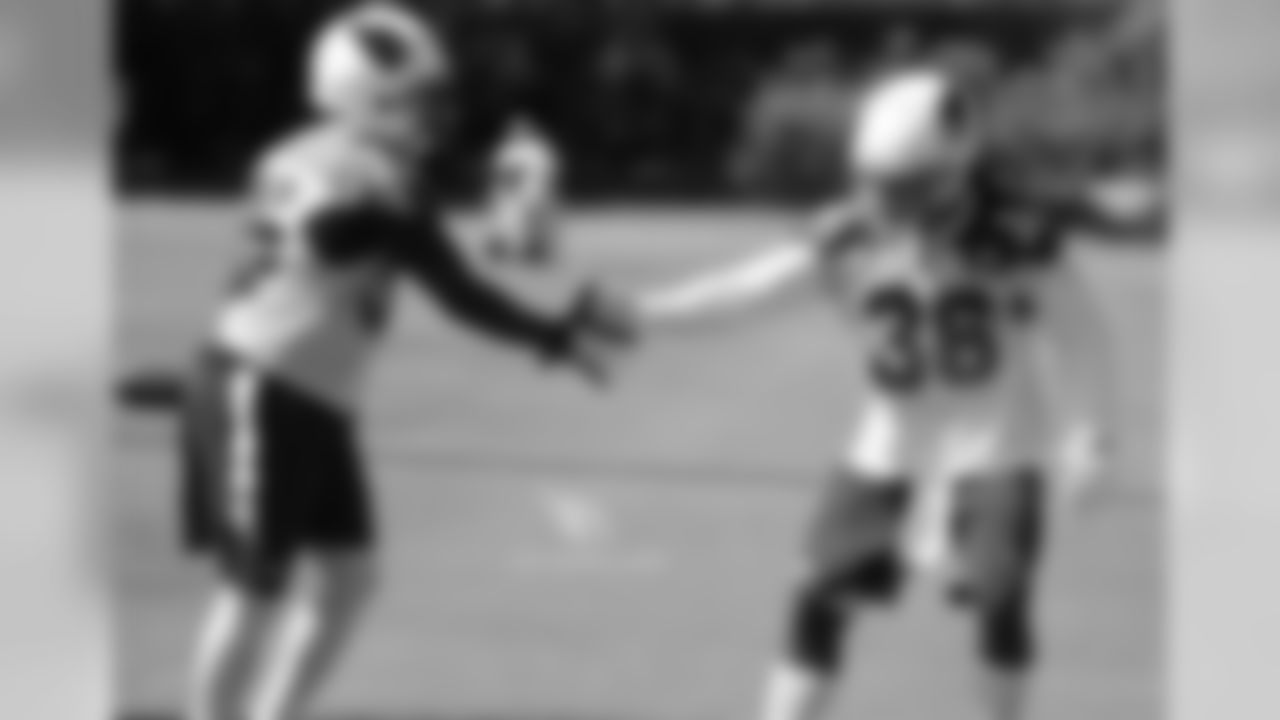 CB Cariel Brooks (left) is congratulated after making an interception