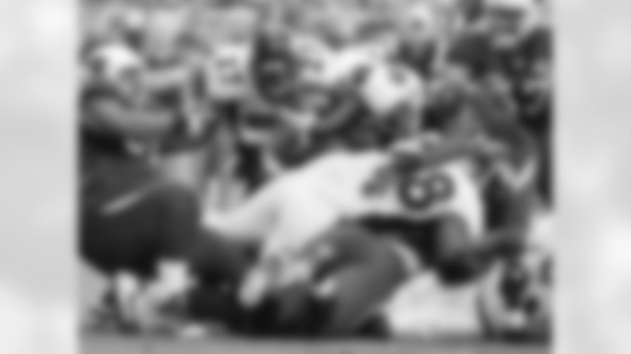 2010 vs. Broncos: Knowshon Moreno tries to break through a pile.
