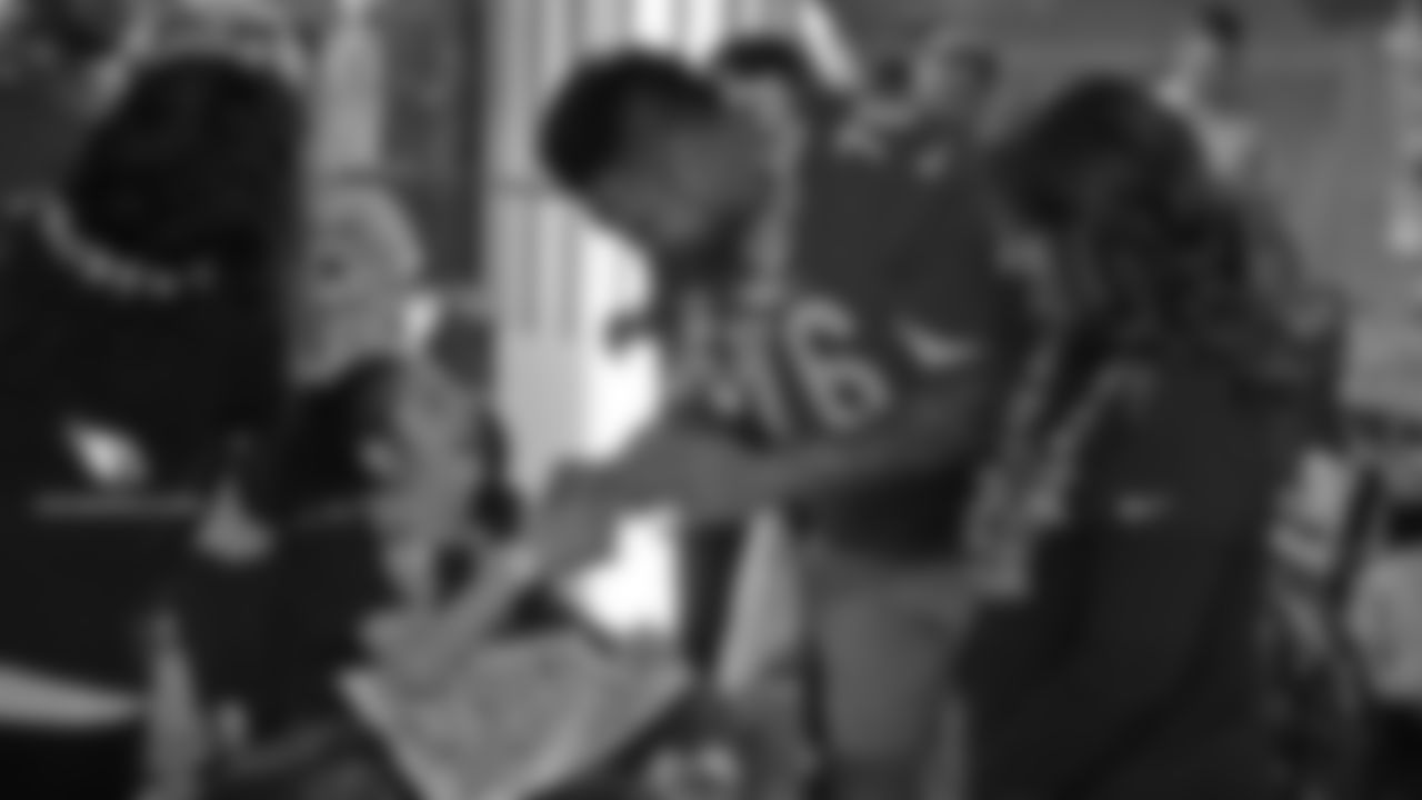 G Mike Iupati says hello to a young patient