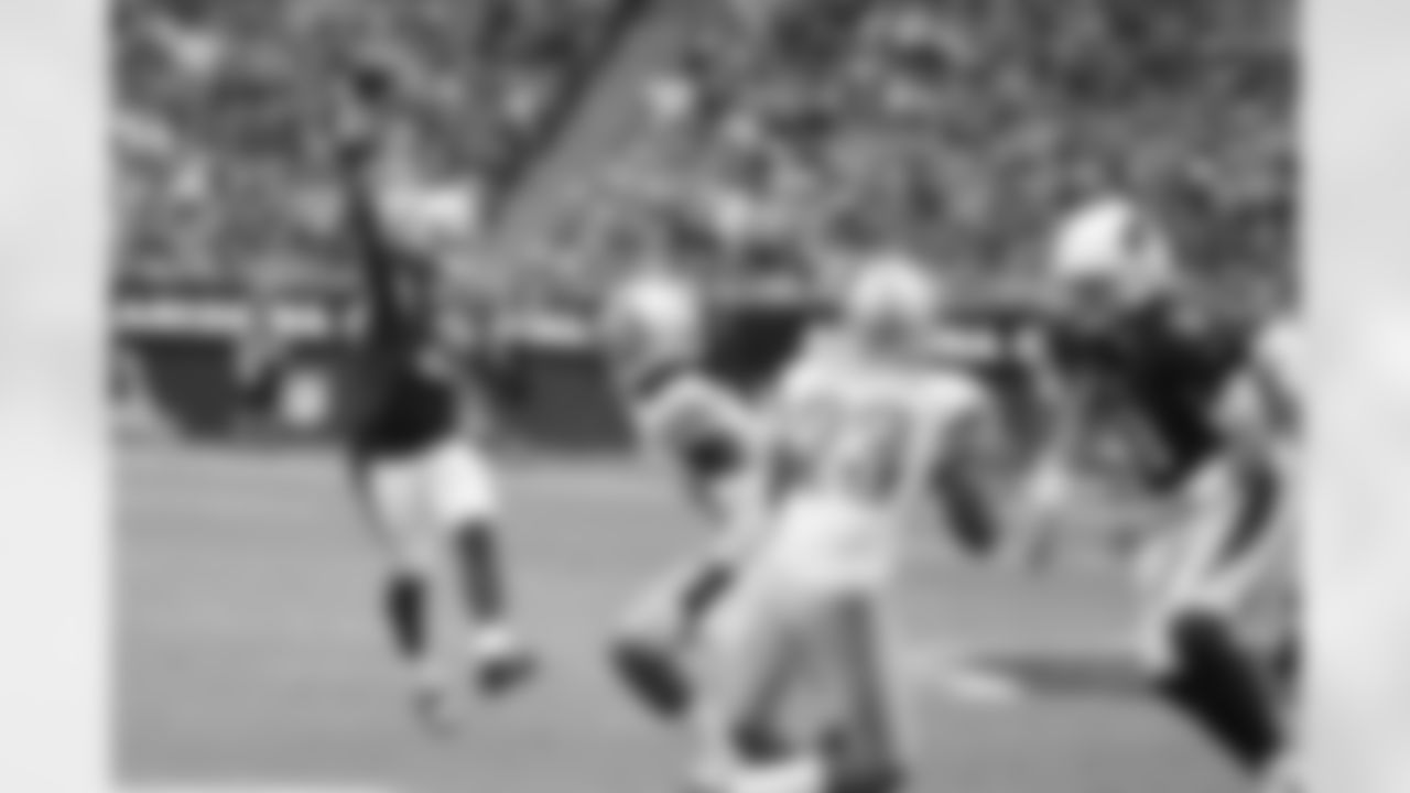 The versatile Peterson throws a pass