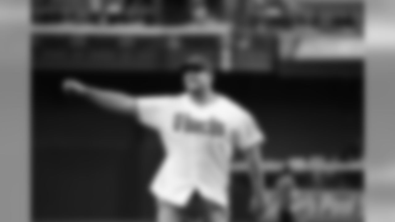 T Jared Veldheer acknowledges the crowd after his first pitch