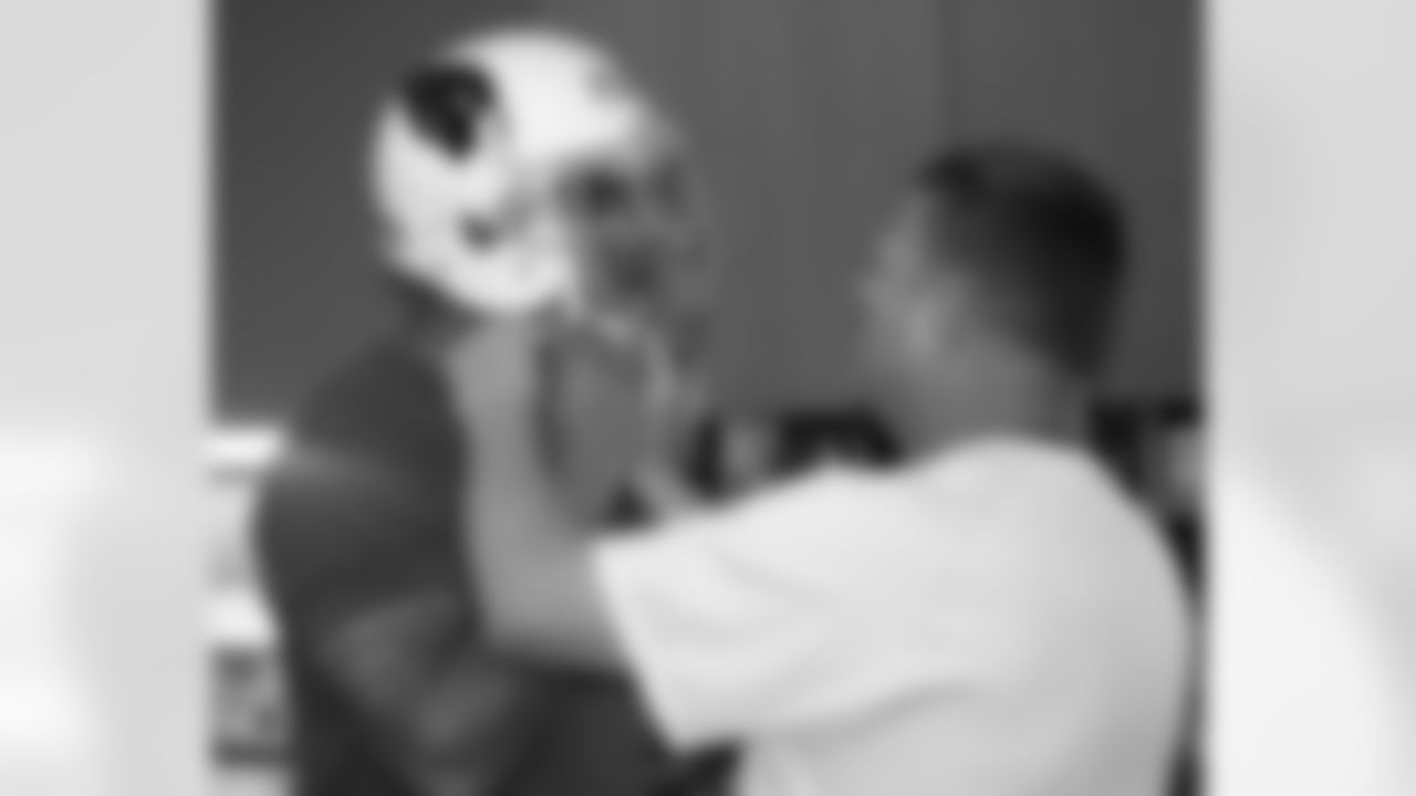 Michael Floyd tests out a new helmet