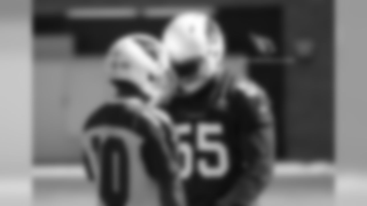 WR Brittan Golden (left) and LB Chandler Jones pretend to talk trash