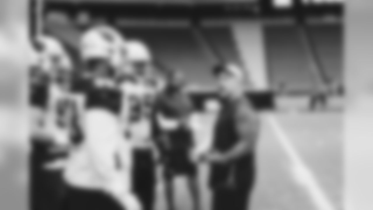 Defensive line coach Chris Achuff