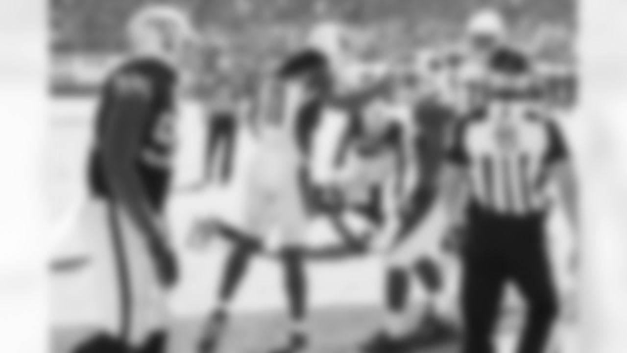 WR Larry Fitzgerald congratulates RB Stepfan Taylor after his score in Oakland