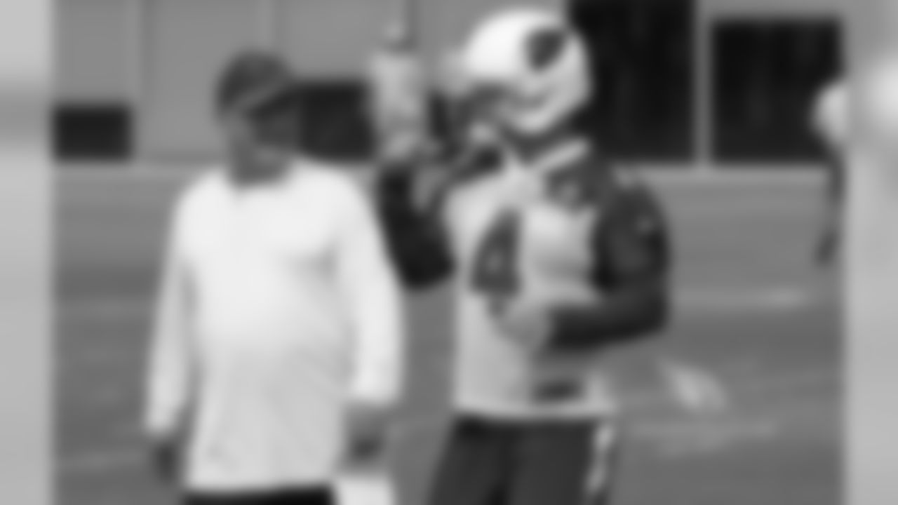 K Phil Dawson (right) has a laugh with special teams coordinator Amos Jones