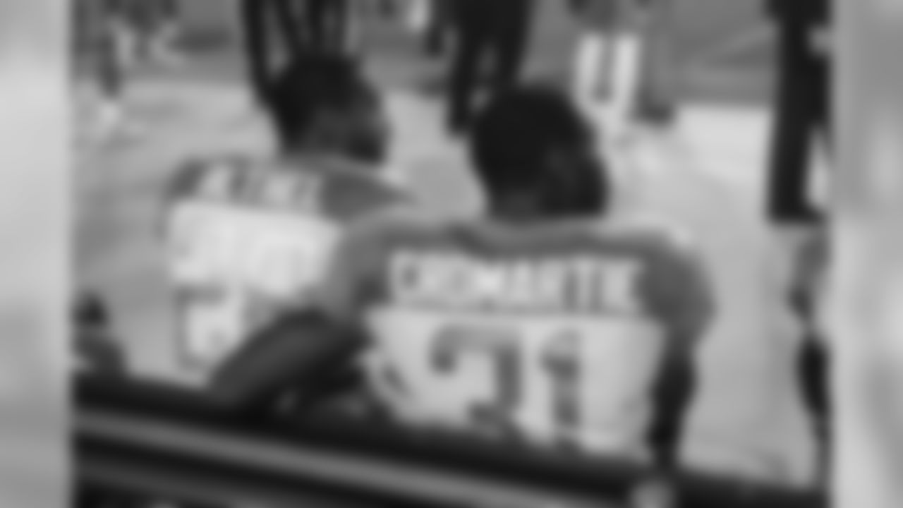 Justin Bethel and Antonio Cromartie on the bench