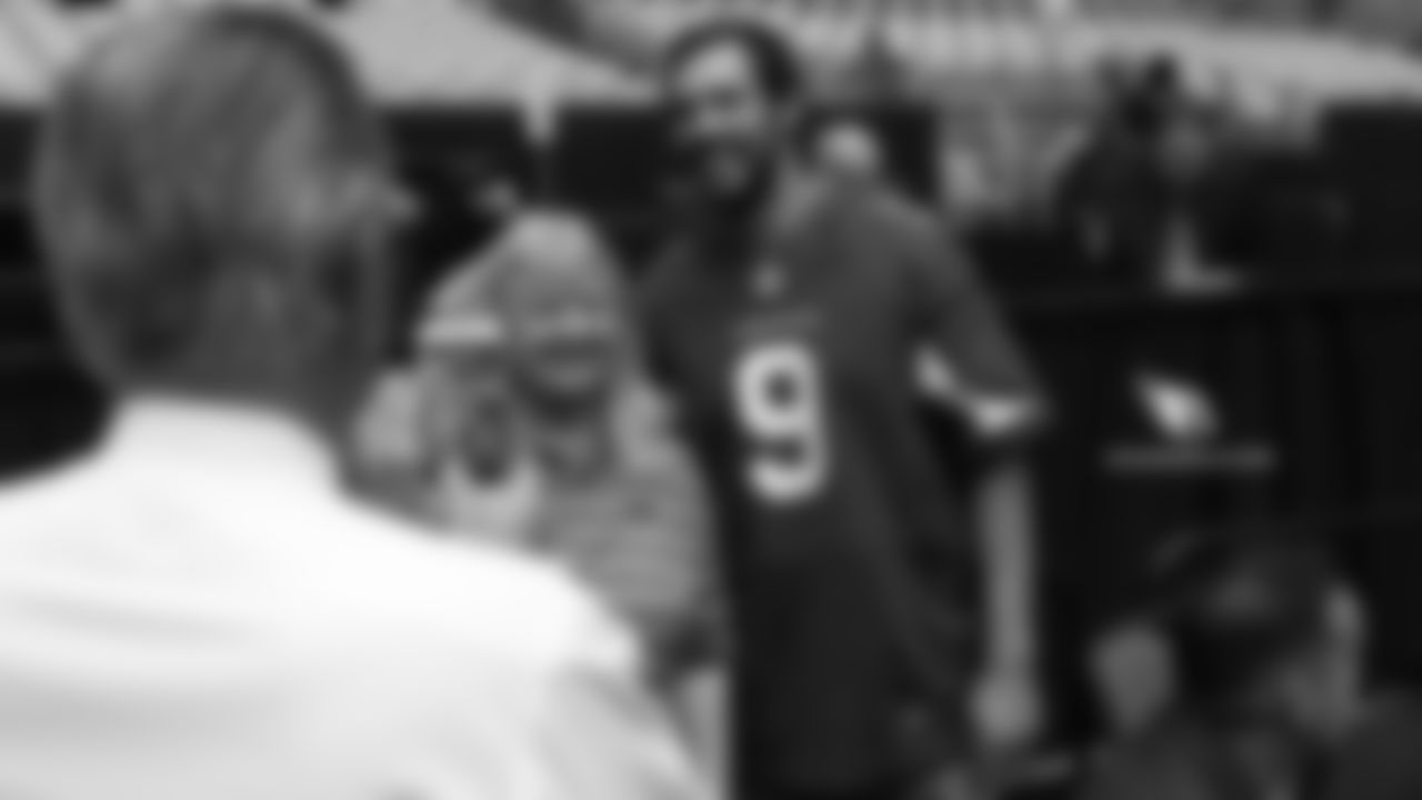 QB Sam Bradford takes a photo with a fan