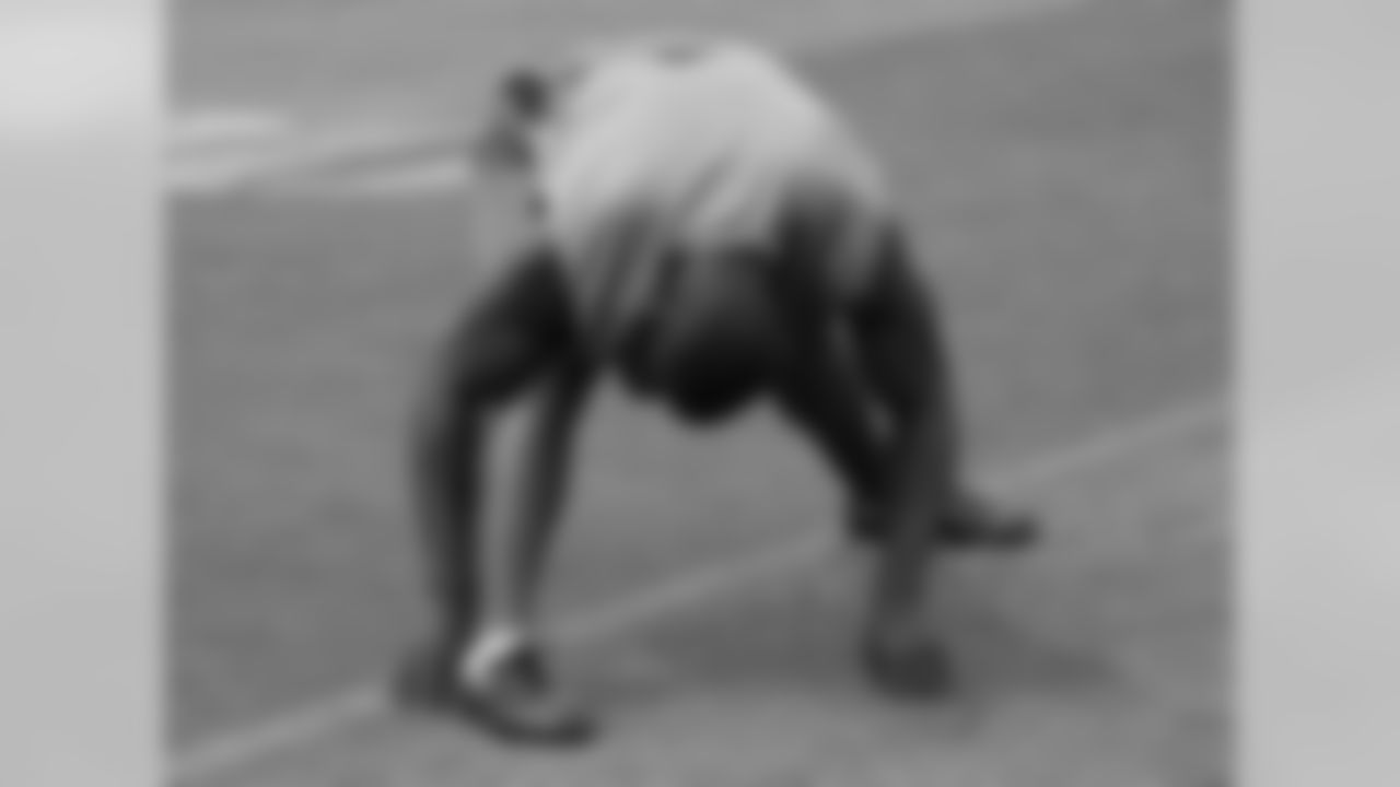 CB Antrel Rolle stretches prior to Run Test